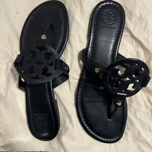 Tory Burch Black Sandals with Medallion Design